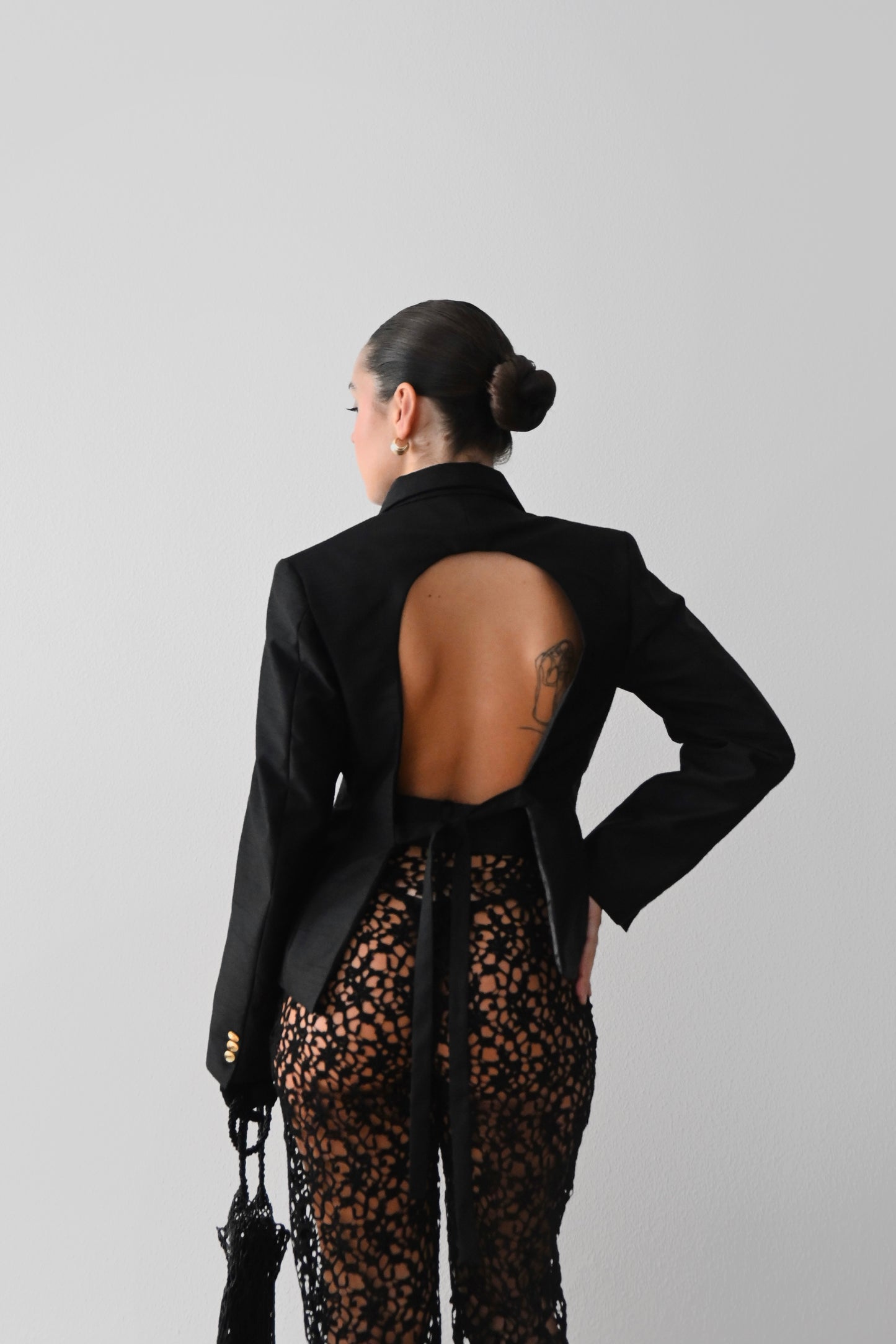 Chaqueta oro negro