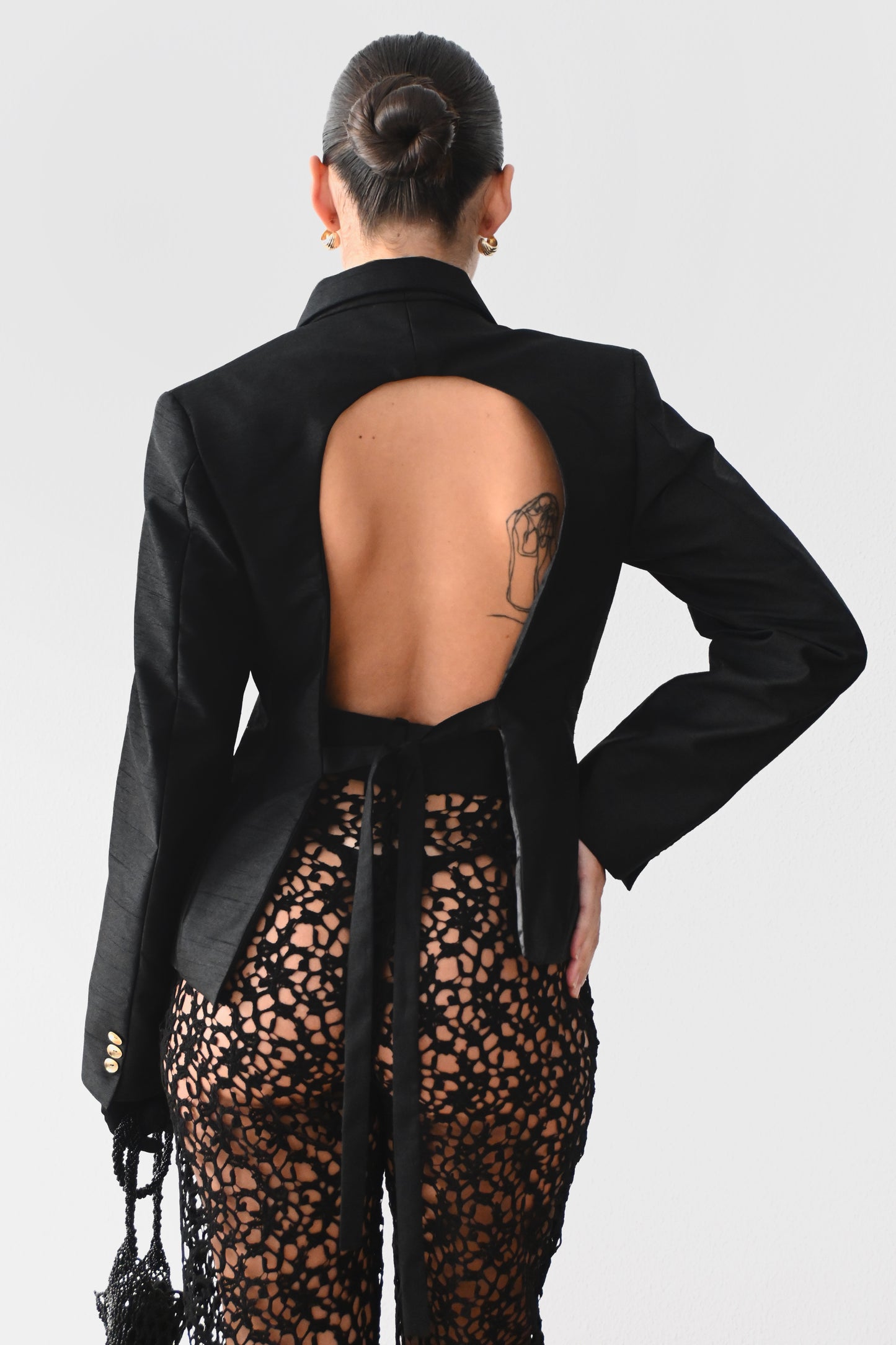 Chaqueta oro negro
