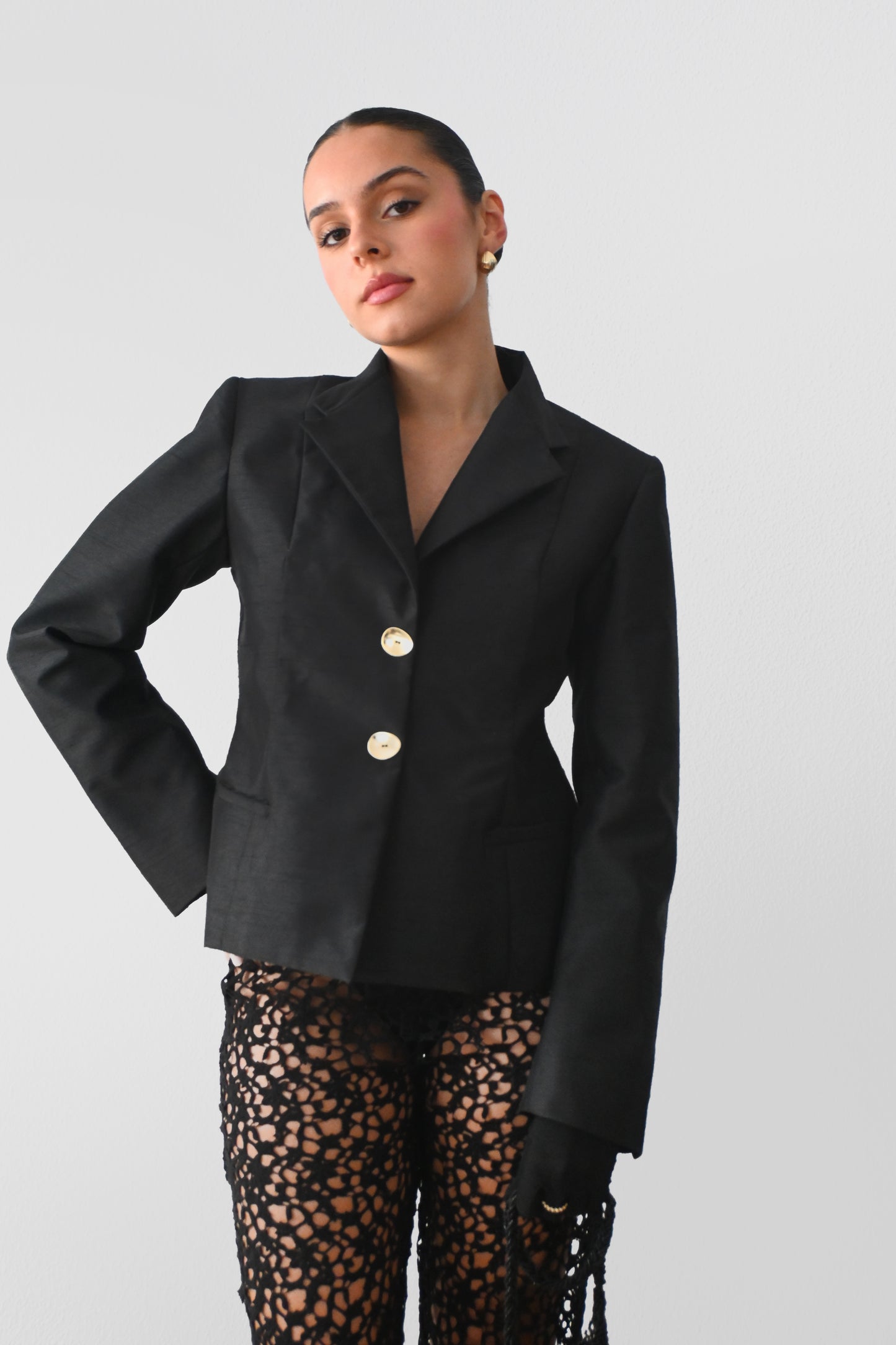 Chaqueta oro negro